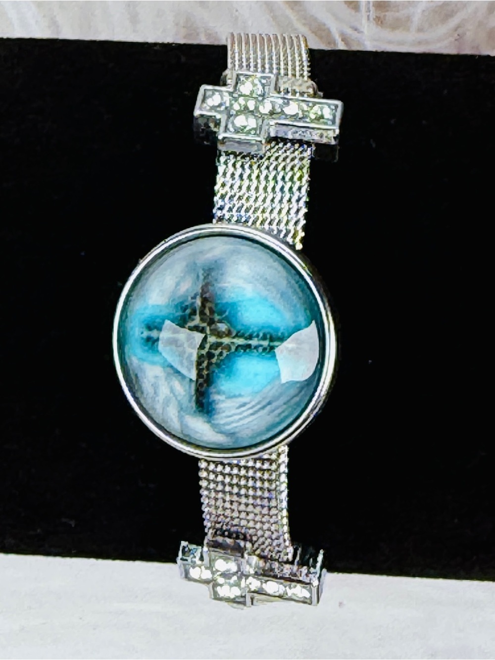 Silvertone Mesh Snap Bracelet with Blue Cross Design